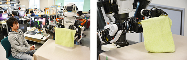 布を折りたたむロボット